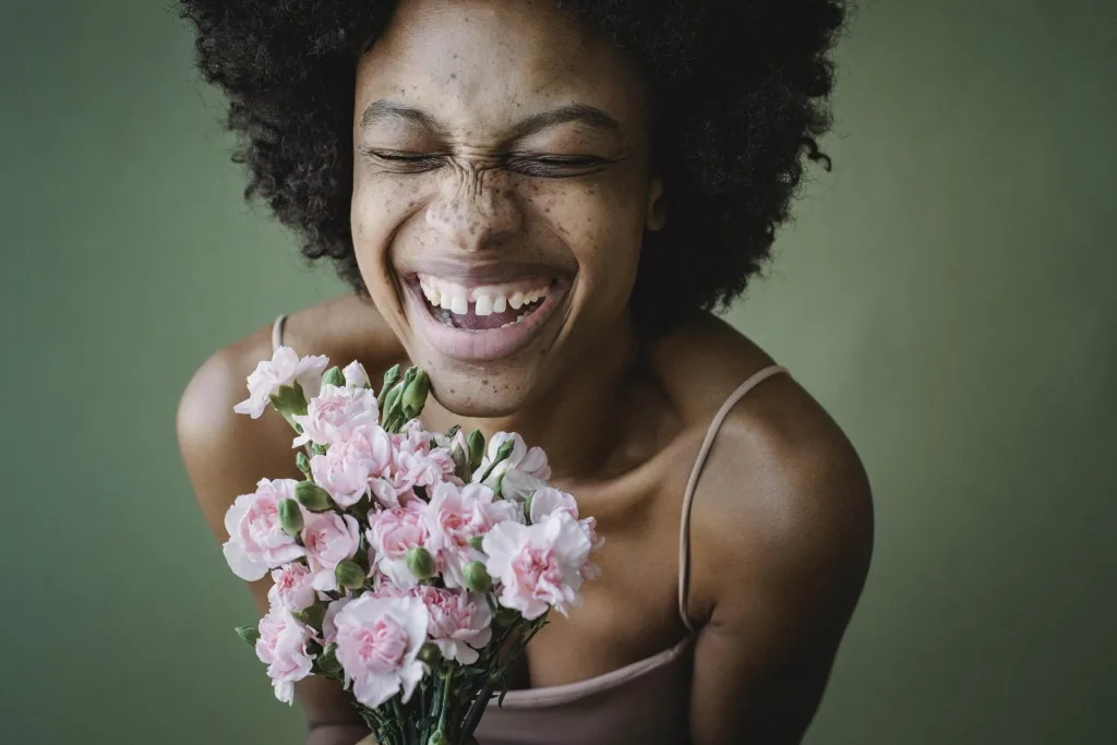 black woman laughting and happy